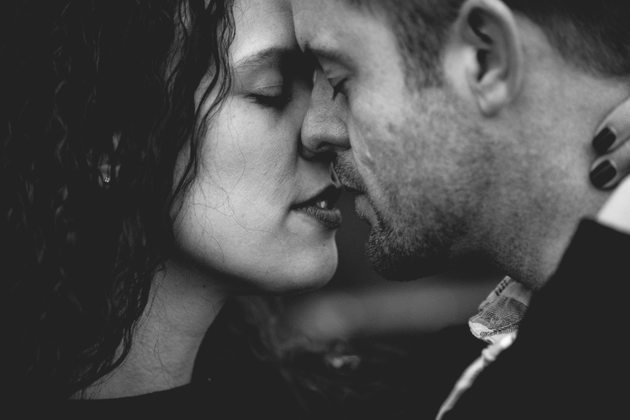 Couple sharing an intimate moment, representing the difference between romantic chemistry and long-term compatibility.